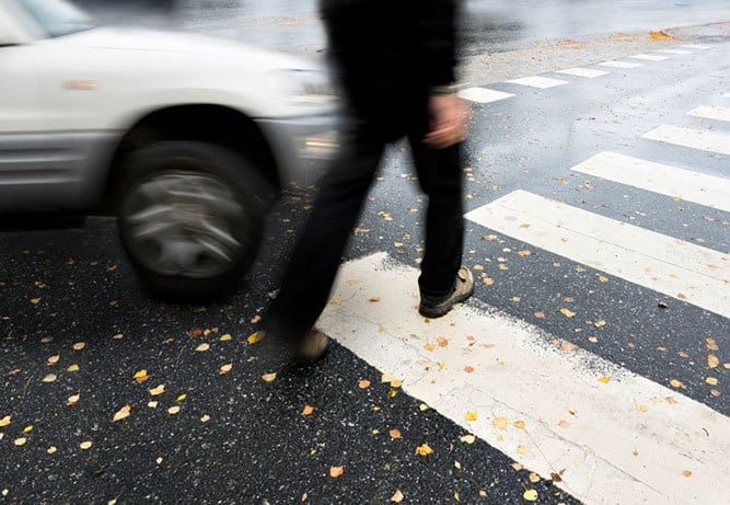 pedestrian almost hit by car